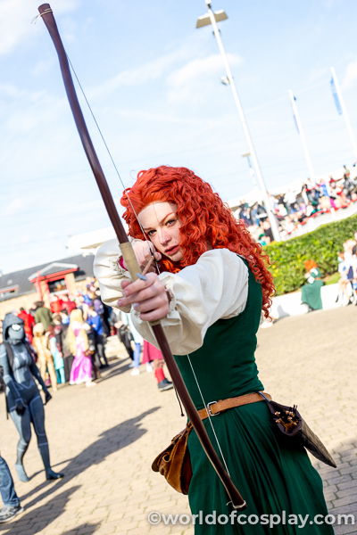 Merida cosplay from Brave, with her bow.
