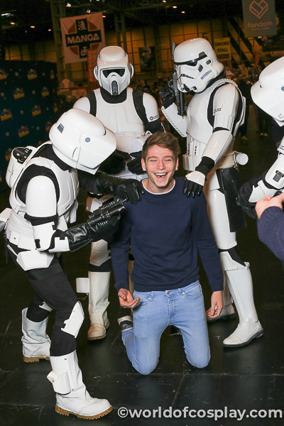 Armed and dangerous coplay 'troopers detain an infiltrator from the Rebel Alliance