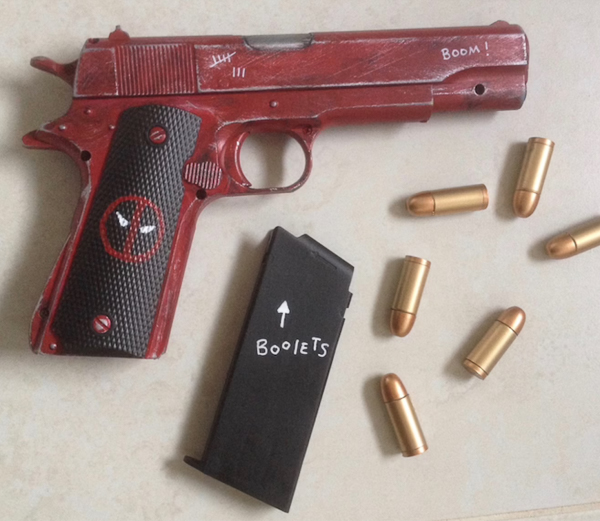 Cosplay Deadpool-customised handgun has a removable clip and working slide.