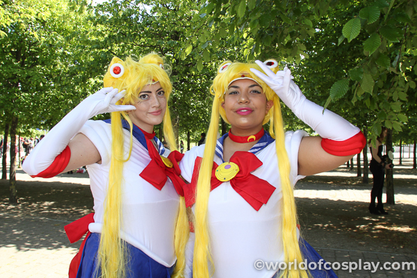 Cosplayers pose for the camera